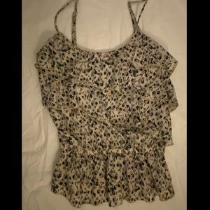 Flower tank top with ruffles/peplum